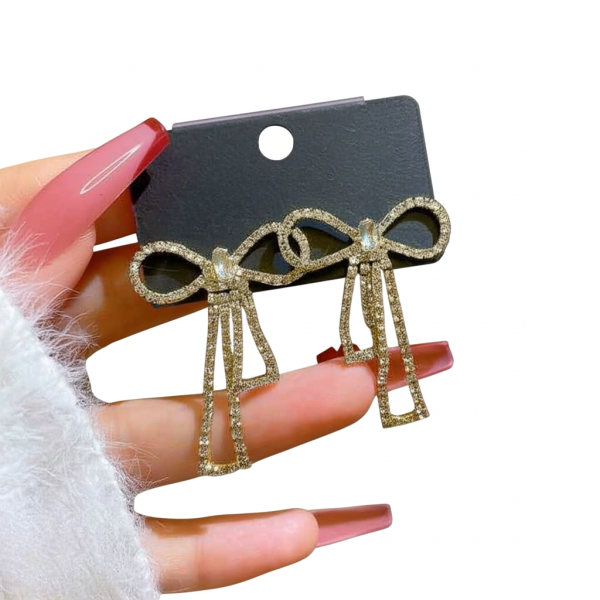 qt-985 Touch Of Glamour To Your Look With These Bow Shape Zircon Korean Earrings – Color Golden