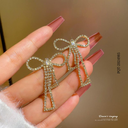 qt-985 Touch Of Glamour To Your Look With These Bow Shape Zircon Korean Earrings – Color Golden